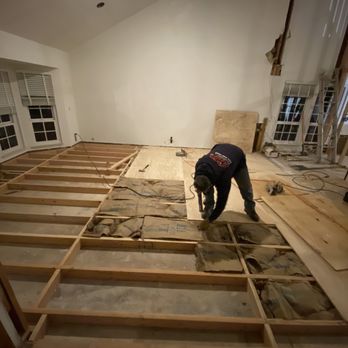 Henrik's Construction Group - Raising sunken subfloor before... - General Contractors Near Me