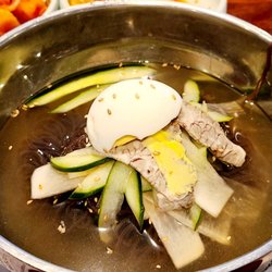 Lee's Sushi - Mul naeng myon (chilled noodle soup), with an egg on top. Served with vinegar and mustard (condiments).