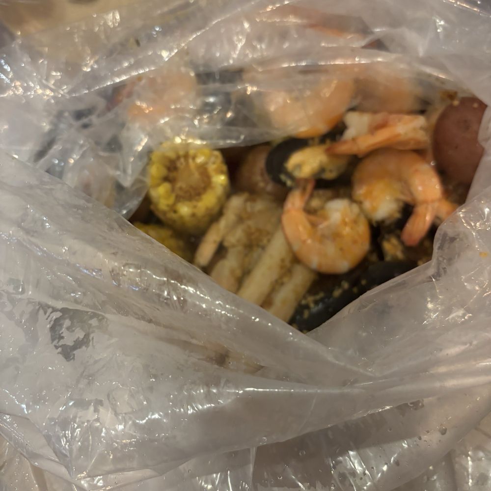 Mr. Crab House - The boil came out wrapped in a plastic bag which kept everything hot until we were ready to eat - Seafood Near Me - Cincinnati, Ohio Mr. Crab House - The boil came out wrapped in a plastic bag which kept everything hot until we were ready to eat - Seafood Near Me - Cincinnati, Ohio