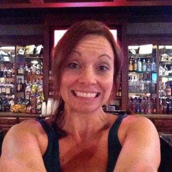 Pub 13 - a woman in a sports bra top - Sports Bars Near Me - Pontiac, Illinois