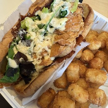Three Dolls - Chicken Caesar sandwich with tater tots - Bakeries Near Me - Indianapolis, Indiana