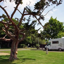 Lytton Lawn Touring Park - Spacious serviced hard-standing pitches are perfect for touring caravans or campervans.