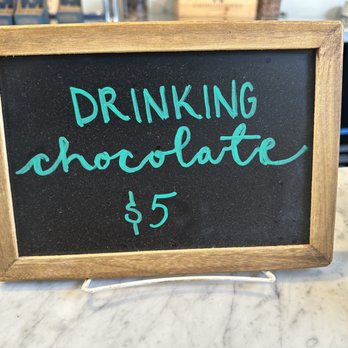 Woodblock Chocolate - a blackboard with a green writing on it - Chocolatiers & Shops Near Me - Portland, Oregon Woodblock Chocolate - a blackboard with a green writing on it - Chocolatiers & Shops Near Me - Portland, Oregon