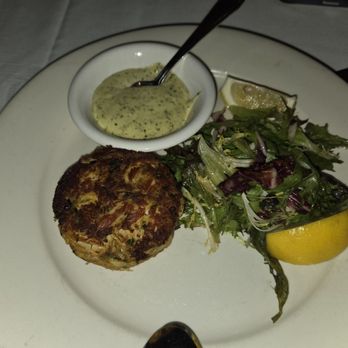 Wolfgang's Steakhouse - Crab cake with remoulade and greens - Steakhouses Near Me - New York, New York