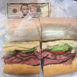 Large roast beef grinder with lettuce, tomatoes, and provolone cheese. No it's not two grinders, it's just one! Large roast beef grinder with lettuce, tomatoes, and provolone cheese. No it's not two grinders, it's just one!