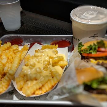 Shake Shack The Wharf - 2 shack burgers, fries (one with cheese) and a strawberry shake - Fast Food Near Me - Washington, DC, District of Columbia Shake Shack The Wharf - 2 shack burgers, fries (one with cheese) and a strawberry shake - Fast Food Near Me - Washington, DC, District of Columbia