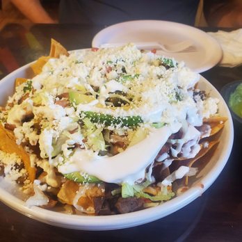 Fiesta Oaxaqueña - Chicken and beef nachos - ridiculously large. Easily can fill 2 people alone - Mexican Near Me - Pleasantville, New Jersey
