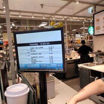 Starbucks - a woman working at a cash register - Coffee & Tea Near Me - Las Vegas, Nevada Starbucks - a woman working at a cash register - Coffee & Tea Near Me - Las Vegas, Nevada