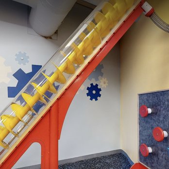 DuPage Children's Museum - This had hoses for the balls to go through to the bottom tray, but one of the hoses was torn and did not hang correctly. - Children's Museums Near Me - Naperville, Illinois