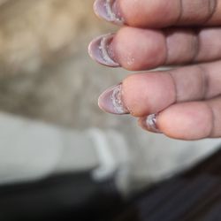 Bellagio Nails & Spa - Unfiled, no finishing touched to clean the nails