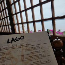 a menu with a view of the ocean