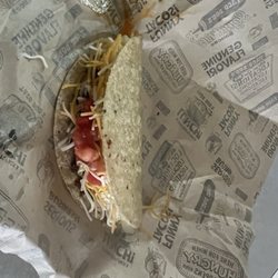 Taco Bob's - Hard shell taco with beef, lettuce, cheese and tomatoes.