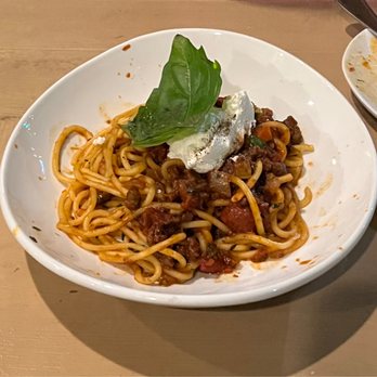 a mano - Bucatini alla bolognese - Italian Near Me - Atlanta, Georgia a mano - Bucatini alla bolognese - Italian Near Me - Atlanta, Georgia