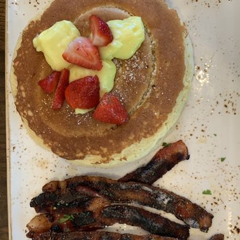 First Watch - Dry Lemon Cured pancakes and burnt million dollar bacon. - Breakfast & Brunch Near Me - Dallas, Texas