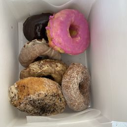 Prickly pear, tiramisu cream , chocolate iced, cardamom, maple donuts.