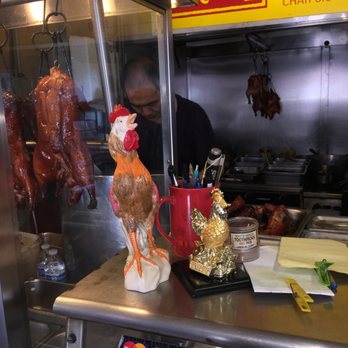 Roast Duck Kitchen - Butcher at work. - Chinese Near Me - Aiea, Hawaii Roast Duck Kitchen - Butcher at work. - Chinese Near Me - Aiea, Hawaii