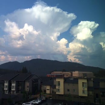 Discovery Heights Apartments - Clouds from balcony. - Apartments Near Me - Issaquah, Washington Discovery Heights Apartments - Clouds from balcony. - Apartments Near Me - Issaquah, Washington