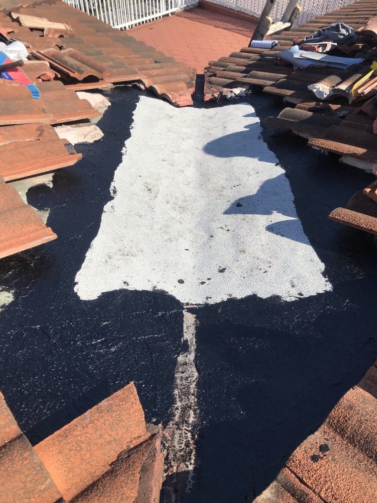 Slide of Red River Roofing