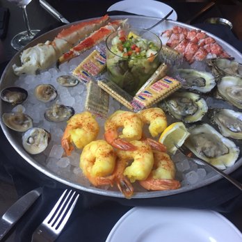 River & Post - Seafood platter with ceviche in the middle - Lounges Near Me - Jacksonville, Florida River & Post - Seafood platter with ceviche in the middle - Lounges Near Me - Jacksonville, Florida