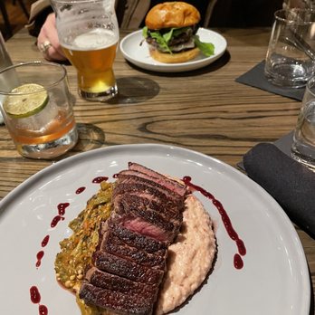 Hendrix - Ribeye with goat cheese grits and sautéed vegetables. - Bars Near Me - Columbia, South Carolina