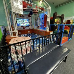 Seating alongside play areas for adults