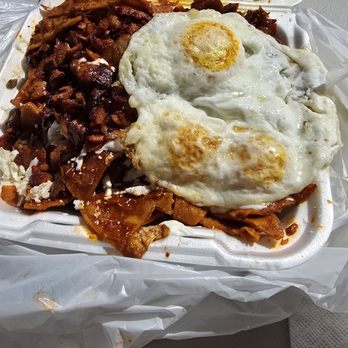 Don Chilaquiles - Pastor with over easy eggs. Delicious but needed more crema - Mexican Near Me - Los Angeles, California Don Chilaquiles - Pastor with over easy eggs. Delicious but needed more crema - Mexican Near Me - Los Angeles, California