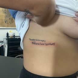 My new tattoo by Evan, my three nieces' handwriting with a Spanish quote. My new tattoo by Evan, my three nieces' handwriting with a Spanish quote.