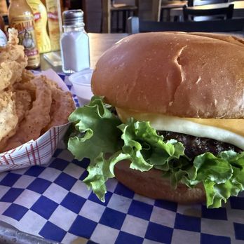 PhD - Pour House Dallas - Classic cheeseburger with Onion strings. - American Near Me - Dallas, Texas PhD - Pour House Dallas - Classic cheeseburger with Onion strings. - American Near Me - Dallas, Texas