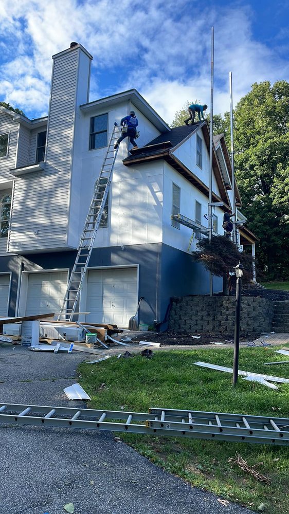 Slide of Texas Best Roofing & Restoration