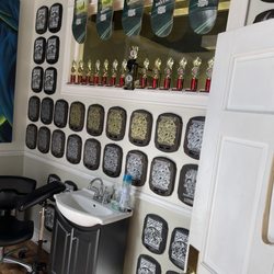 Zenith City Piercing and Tattoo - Tattoo artists studio.... WOW, that's a lot of competitions.