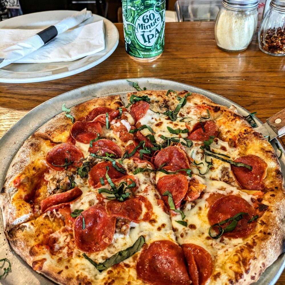 My own pizza... pepperoni, Italian sausage, roasted tomatoes,, basil. Wonderful.