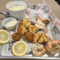 1/2 grilled and 1/2 fried shrimp and coleslaw side. 1/2 grilled and 1/2 fried shrimp and coleslaw side.