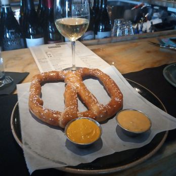 Reunion Kitchen + Drink - Awesome Pretzel with spicy mustard on Happy Hour. Yummy. - New American Near Me - Anaheim, California Reunion Kitchen + Drink - Awesome Pretzel with spicy mustard on Happy Hour. Yummy. - New American Near Me - Anaheim, California