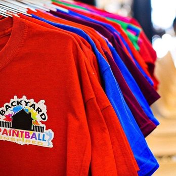 OCA Party Rentals - Tshirt sale at a party - Bounce House Rentals Near Me - Jacksonville, North Carolina