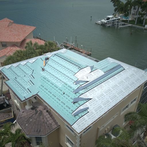 Slide of Reggie Reed Roofing