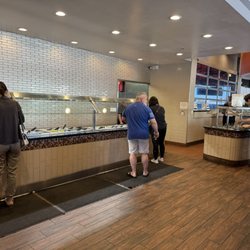 Big Wok Mongolian Bar-B-Q - Raw meats and vegetable, building station. To the right is the sauce station
