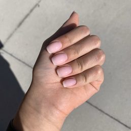 Beautiful dip nails in natural pink.