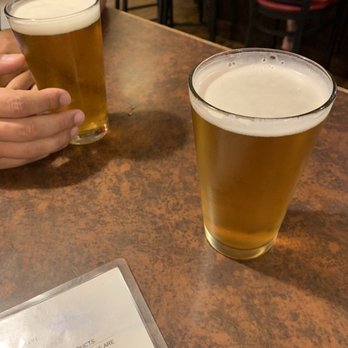 Double Tap Pub - two glasses of beer on a table - Pubs Near Me - Boise, Idaho Double Tap Pub - two glasses of beer on a table - Pubs Near Me - Boise, Idaho