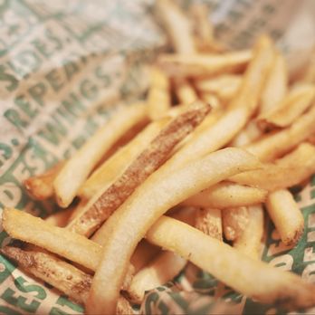 Wingstop - Seasoned Fries. The seasoning is amazing: sweet, salty, and spiced. - Chicken Wings Near Me - Mission Viejo, California