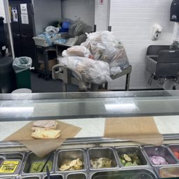 a counter with a variety of food items a counter with a variety of food items