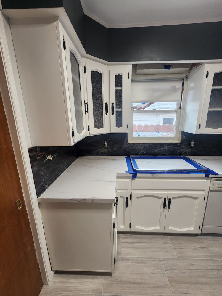 Slide of Four A's Remodeling & Construction