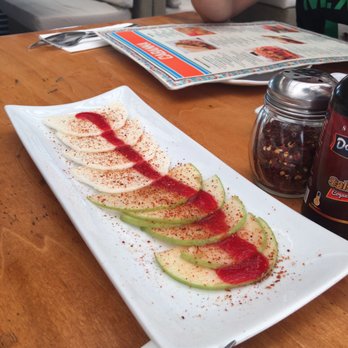 Cabanna - The Apple and jicama slices you get with chamoy - Seafood Near Me - Tijuana, BCN