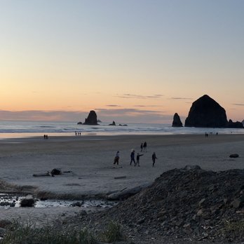 Mo's Seafood & Chowder - View of Haystack Rock at sunset from beside the Mo's outdoor dining patio. - Seafood Near Me - Cannon Beach, Oregon Mo's Seafood & Chowder - View of Haystack Rock at sunset from beside the Mo's outdoor dining patio. - Seafood Near Me - Cannon Beach, Oregon