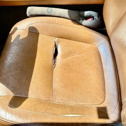 Derby City Upholstery - Before- Ripped Driver Seat