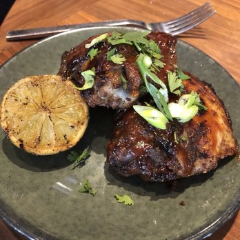 Meril - Chicken thighs - were a little pink inside - New American Near Me - New Orleans, Louisiana Meril - Chicken thighs - were a little pink inside - New American Near Me - New Orleans, Louisiana