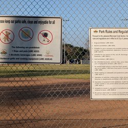 San Martin Park - A couple of signs by the softball field