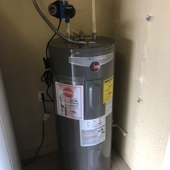 M&M Plumbing Company - 40 gallon water heater in garage with recirculating pump - Plumbing Near Me M&M Plumbing Company - 40 gallon water heater in garage with recirculating pump - Plumbing Near Me