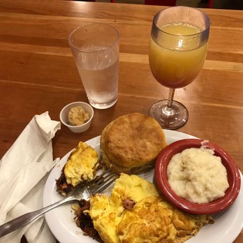 Ruby Slipper Decatur - Grits, biscuit ham and cheese omelette and a champagne pomegranate oj - Breakfast & Brunch Near Me - New Orleans, Louisiana Ruby Slipper Decatur - Grits, biscuit ham and cheese omelette and a champagne pomegranate oj - Breakfast & Brunch Near Me - New Orleans, Louisiana