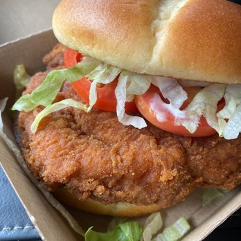 McDonald's - a chicken sandwich with lettuce and tomatoes - Burgers Near Me - Arkadelphia, Arkansas McDonald's - a chicken sandwich with lettuce and tomatoes - Burgers Near Me - Arkadelphia, Arkansas