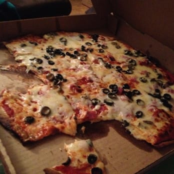 Pizza Shuttle - XL thin crust with genoa salami, black olives, and Swiss cheese...best pizza I have ever had from the shuttle! - Pizza Near Me - Milwaukee, Wisconsin